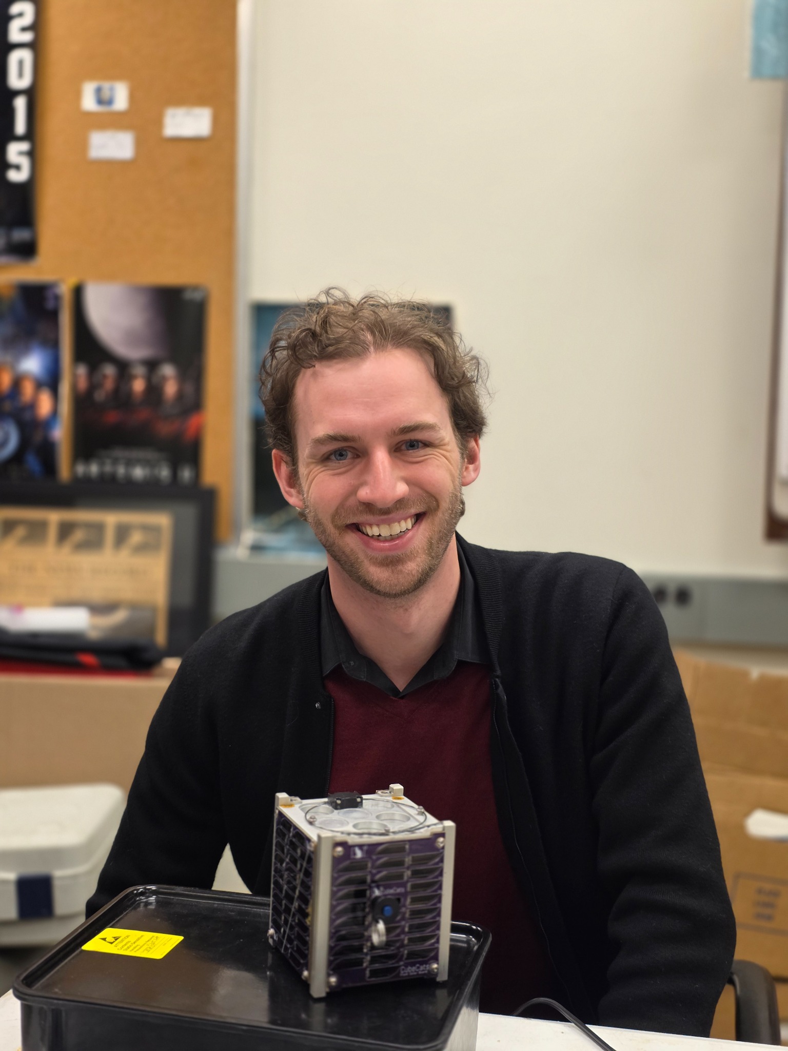 Mike Carovillano with CubeSat flight hardware